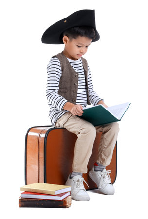 Cute little pirate with adventure book on white backgroundの写真素材