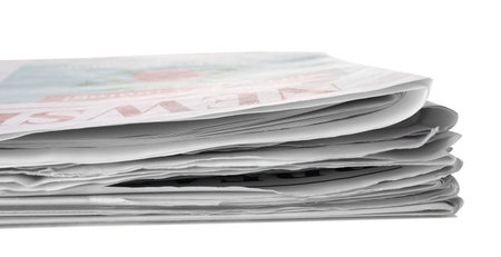 Stack of newspapers isolated on white background