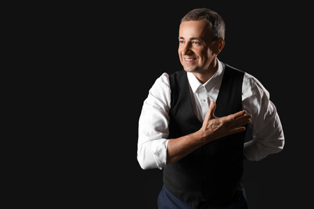 Mature actor on dark backgroundの写真素材