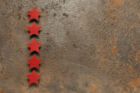 Five stars rating on rusted metal background. Customer experience conceptの写真素材
