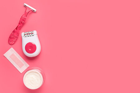 Set for hair removal on pink backgroundの写真素材