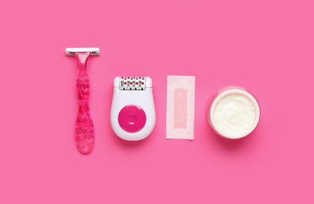 Set for hair removal on pink backgroundの写真素材