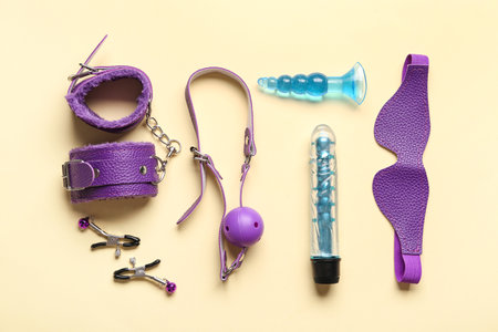 Sex toys on beige backgroundの写真素材