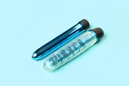 Different vibrators from sex shop on blue backgroundの写真素材
