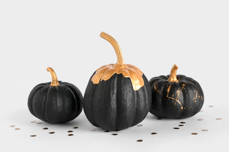 Painted pumpkins on white backgroundの写真素材