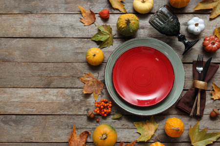Beautiful table setting for Thanksgiving Day celebration on wooden backgroundの写真素材