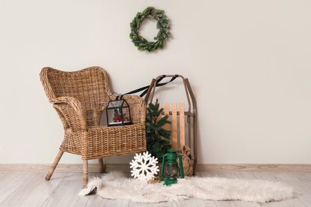 Interior of living room with armchair, Christmas lantern and fir treeの写真素材