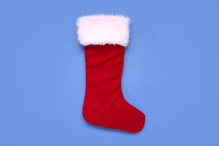 Christmas sock on blue background