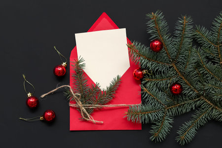 Beautiful composition with blank Christmas card on black background
