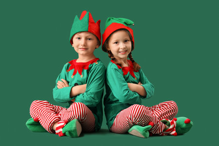Cute little elves on green backgroundの写真素材