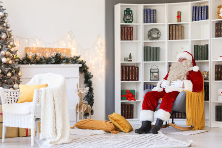 Santa Claus at home on Christmas Eveの写真素材