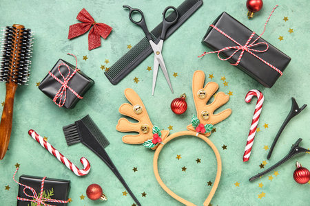 Composition with hairdresser's accessories, Christmas gifts and decorations on color backgroundの写真素材
