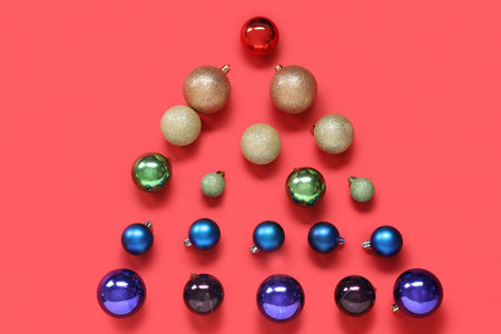 Christmas tree made of balls on red background. LGBT conceptの写真素材