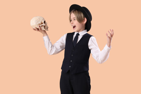 Little actor with skull on beige backgroundの写真素材
