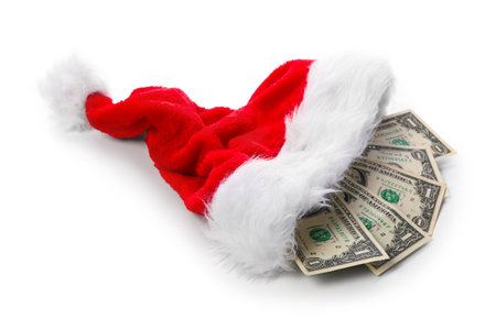 Santa hat with money on white backgroundの写真素材
