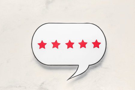 Speech bubble with five stars rating on white grunge background. Customer experience concept