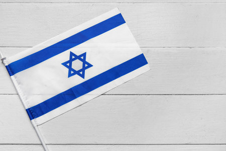 Flag of Israel on white wooden backgroundの写真素材