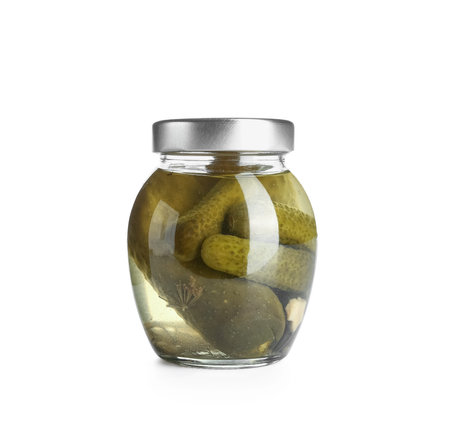 Jar with tasty pickled cucumbers on white backgroundの写真素材