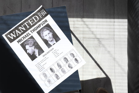 Wanted poster in FBI office, top viewの写真素材