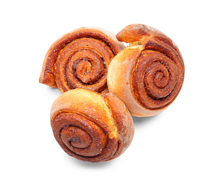 Tasty cinnamon rolls on white backgroundの写真素材