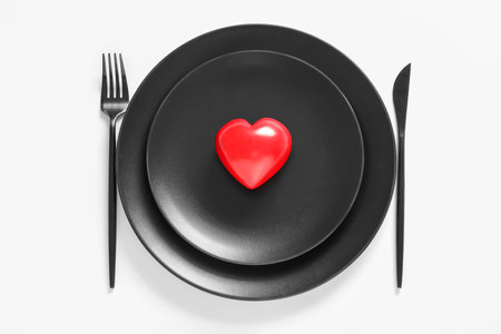 Beautiful table setting for Valentine's Day on white backgroundの写真素材