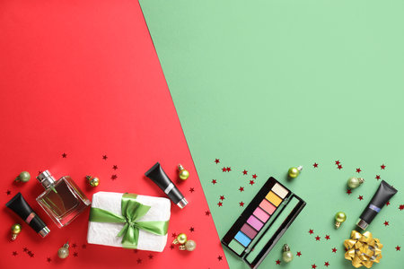Christmas composition with cosmetics on color backgroundの写真素材