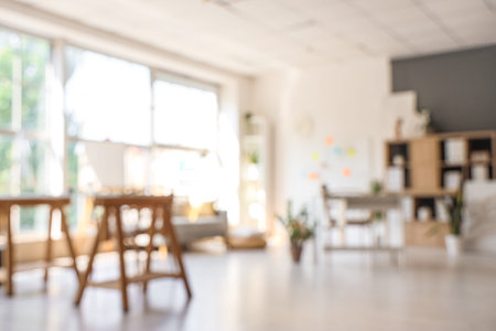 Blurred view of modern office with workplacesの写真素材