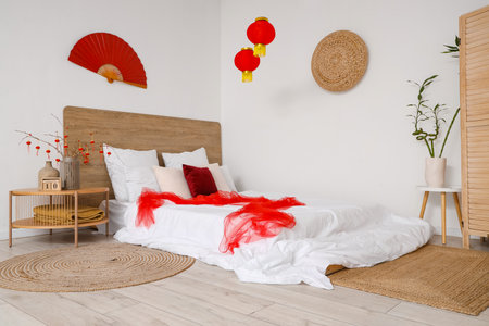 Interior of festive bedroom decorated for Chinese New Year celebrationの写真素材