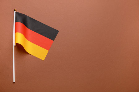 Flag of Germany on brown background