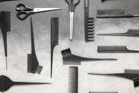 Set of hairdresser's tools on gray backgroundの写真素材