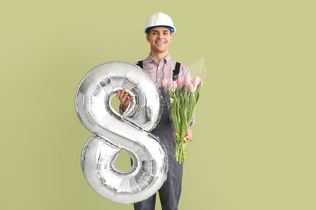 Male worker with tulips and balloon in shape of figure 8 on green background. International Women's...