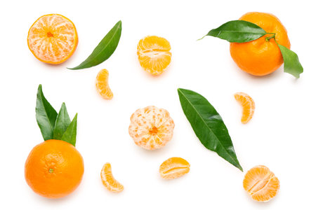 Many sweet mandarins with leaves on white backgroundの写真素材