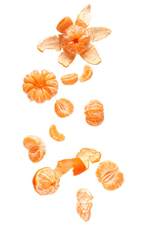 Flying fresh tangerines on white backgroundの写真素材