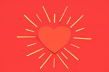 Creative composition with paper heart on red background. Valentine's day celebrationの写真素材