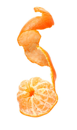 Flying fresh tangerine with peel on white backgroundの写真素材