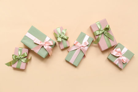 Many gift boxes on beige background. International Women's Dayの写真素材