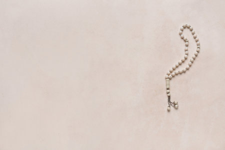 Prayer beads for Ramadan on white grunge backgroundの写真素材
