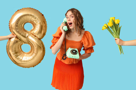 Young woman talking by retro telephone and hands holding bouquet of beautiful tulips with air...