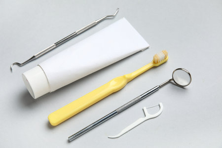 Dental tools and oral hygiene supplies on white background. World Dentist Dayの写真素材