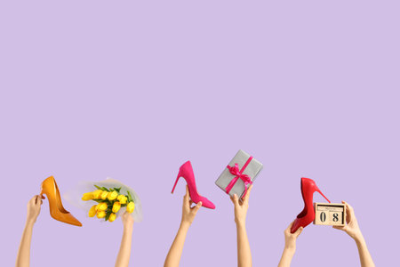 Female hands with bouquet of tulips, high heel shoes and calendar on lilac background. International Women's Day celebrationの写真素材