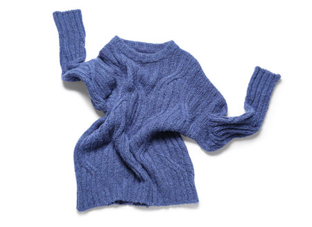 Stylish crumpled sweater isolated on white backgroundの写真素材
