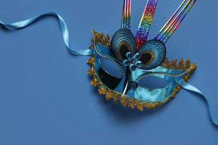 Carnival mask on blue backgroundの写真素材