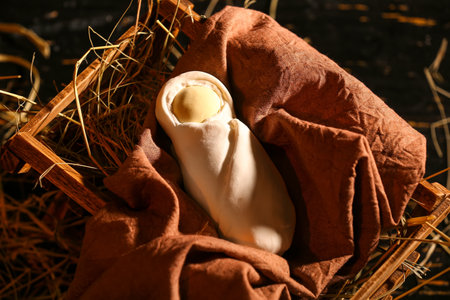 Manger with baby and hay. Concept of Christmas storyの写真素材