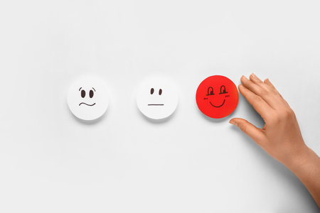 Woman with rating smiles on white background. Customer experience conceptの写真素材