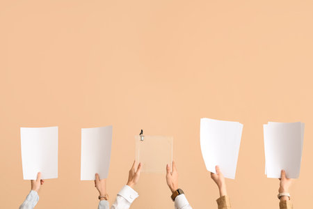 Hands with voting papers and ballot box on beige background. Election conceptの写真素材