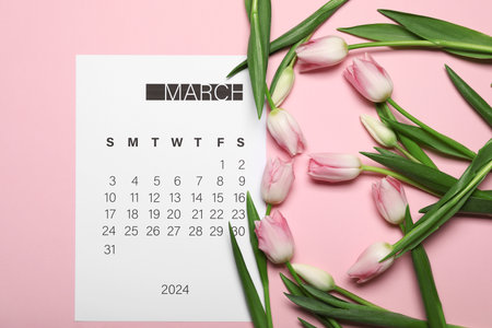 Calendar and tulips on light pink background. Women's Day celebrationの写真素材