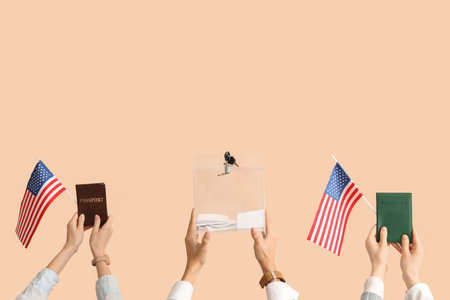 Hands holding ballot box, passports and USA flags on beige background. Election conceptの写真素材