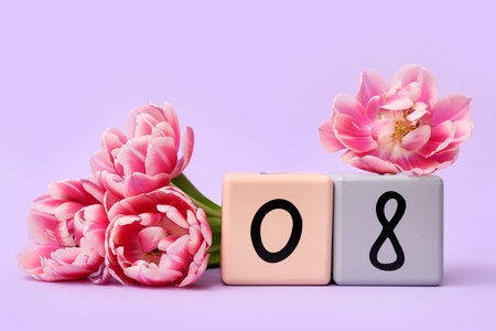 Cube calendar with date 08 and beautiful tulips on lilac background. International Women's Dayの写真素材