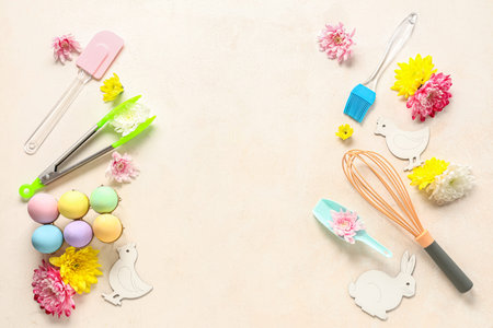 Cooking utensils with Easter eggs, flowers and bunny ears on white background