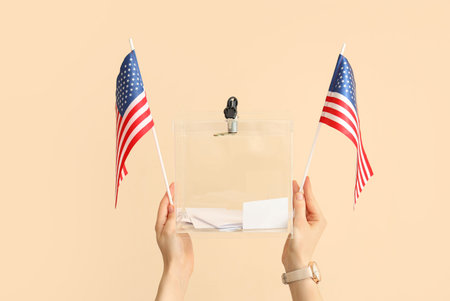 Hands with ballot box and USA flags on beige background. Election concept